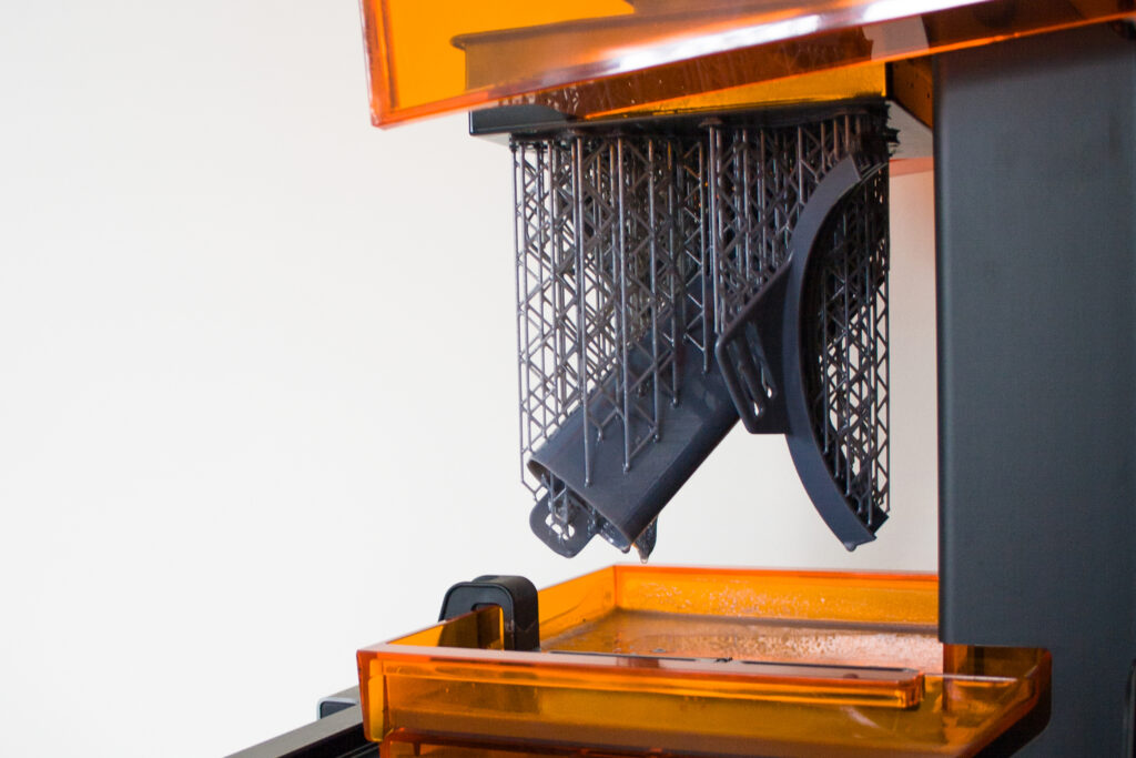 Working 3d printer close up. Automation technology 3D printing of modern swimming mask.